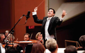 Conductor in front of an orchestra