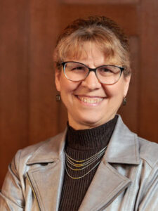 Kristin Bayer, Executive Director.